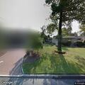 Loose pug running through backyards