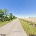 Truck loses cotton bales and blocks highway