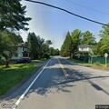 Motorcycle crash and fire in woods near Route 55