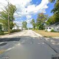 Grass clippings blown into roadway on Cherry Street