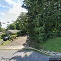 Ongoing dispute with harassing neighbor on Millside