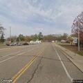 Semi trailer leaning with damaged wheels reported