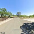 Person walking in roadway near Central Park