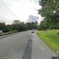 Woman found lying unconscious in parking lot