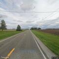 Person suffering severe back pain on State Road 47
