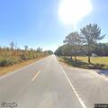 Vehicle windshield hit by tractor trailer