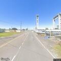Person standing in middle of roadway