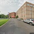 Person experiencing back pain at rehab center near Elkins Park