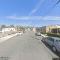 Officer en route to reported theft on Davis Street