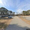 Person with difficulty breathing at auto repair shop