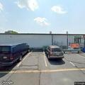 Person having seizures near white Subaru Outback at auction