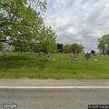 Non-emergency road wash after crash near cemetery