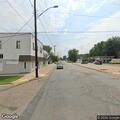 Traffic stop with driver detained on Maple Street
