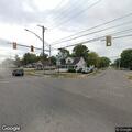 Glass bottle thrown at street sign leaves road hazard