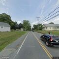 Person filming inside house then walking in roadway