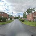 Person slumped in vehicle with vomit outside door