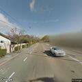 Disabled car with flat tire on I-680 shoulder