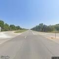 Internet box and brush fire at highway intersection