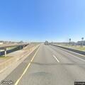 Grass fire on westbound ramp at US 77