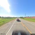 Van stopped in traffic lane on Highway 69