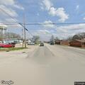 Traffic stop on maroon Pontiac minivan