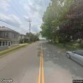 Officer attempts to catch loose dog on Main Street