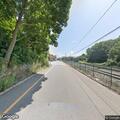 Person reported sick on Riverside Drive corner