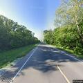 Traffic stop on dark blue GMC SUV near Paris