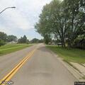 Officers spot wanted person driving discussed car