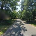 Loose manhole cover reported on Dana Place