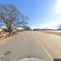 Officer directing school traffic at intersection