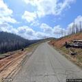 Extinguished campfire near long-term camper site