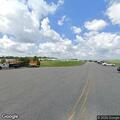 Person found slumped over steering wheel at airport area