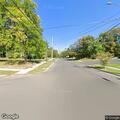 Officer with wanted person on Highland Avenue
