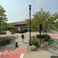 Person asking for help at rear stairs of mall