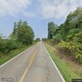 Downed power lines block both lanes on Woodville Road