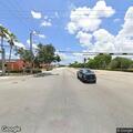 Traffic stop involving black truck and gray car