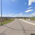 Semi truck hits pole and leaks fuel on roadway