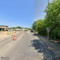 Male found lying on ground near yellow vehicle in Pekin