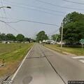 Officer conducts traffic stop on East (license_plate withheld)