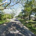 Person crossing road on Pine Crest Road