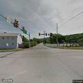 Two-vehicle crash with head injury on National Pike