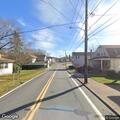 Downed utility pole causes road closure on Wilson St