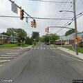 Person experiencing abdominal pain at Lindberg St and Woodfield Rd