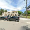 Gray Mercedes blocking driveway entrance