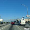 Reckless cargo van weaving in traffic
