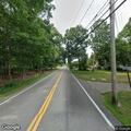 Tree and power lines blocking East Pond Lane intersection