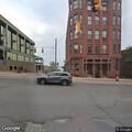 Loose manhole cover at East Washington and Front