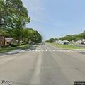 Vehicle with wheel off on William Floyd Parkway