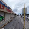 Man unconscious but breathing at gas station pump